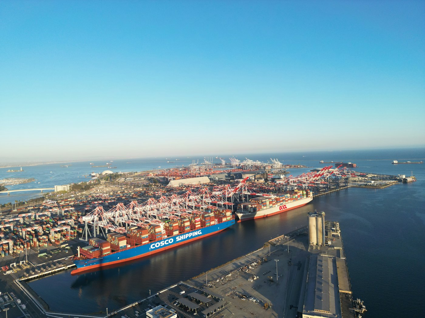 Aerial view of a large cargo ship carrying containers